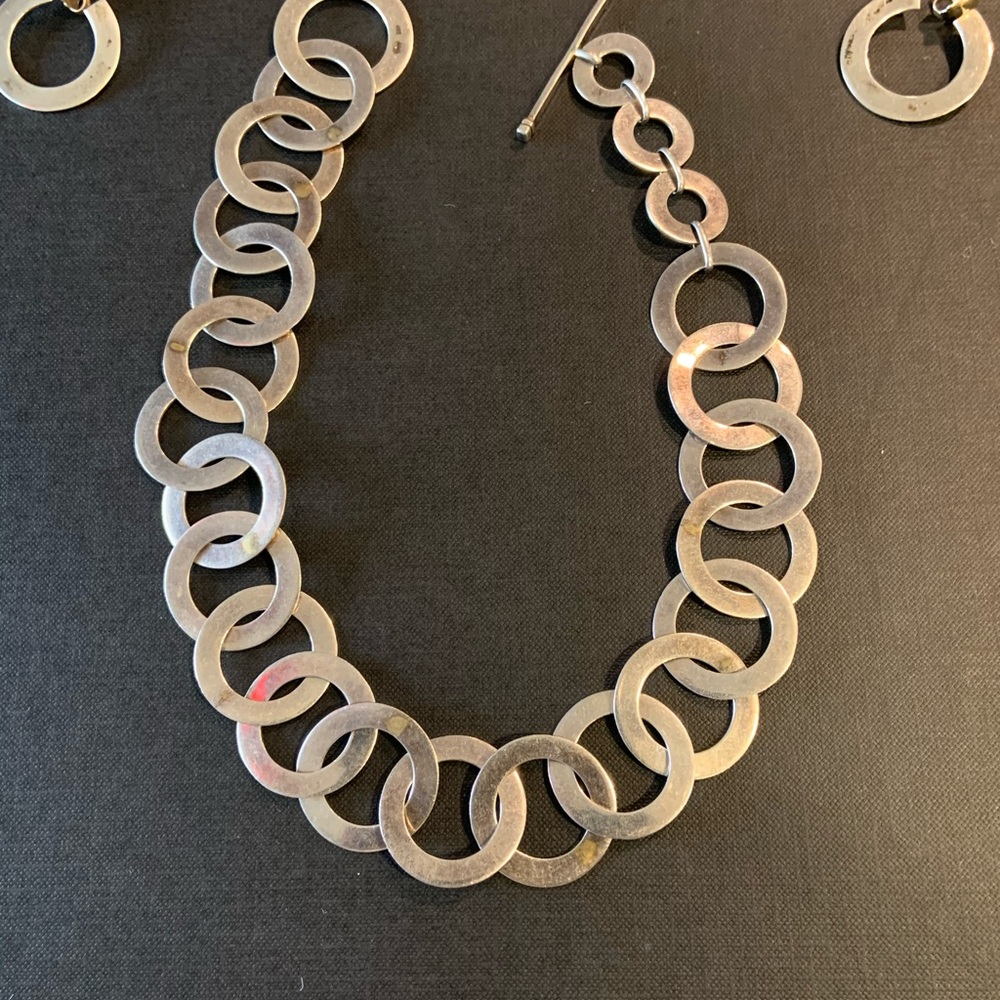 Silver necklace and earrings